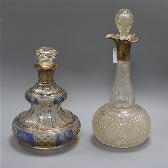A Bohemian silver mounted blue and clear glass flash cut decanter and one other silver mounted decanter tallest 36cm